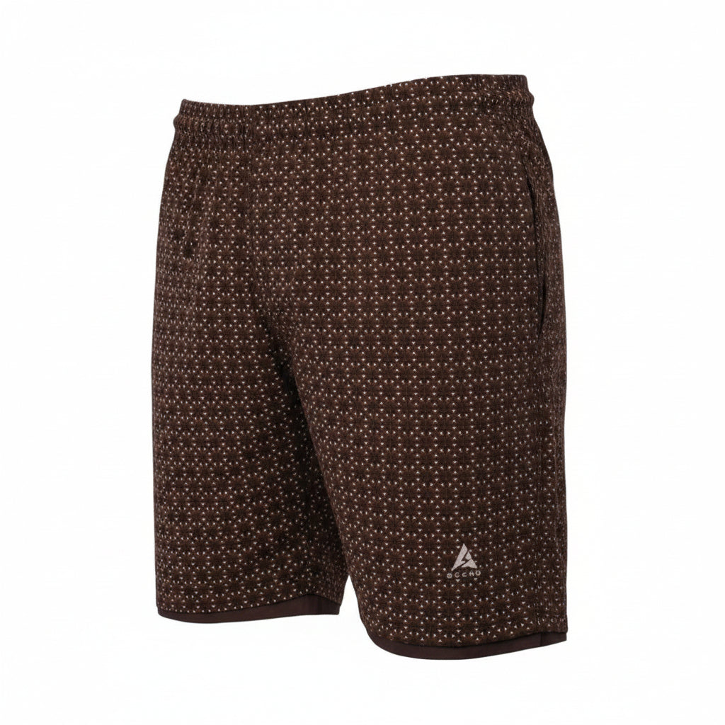 Product photograph of dark brown men's swim shorts with a geometric micro-pattern, featuring an elastic waistband, side pockets, and the silver 'BLEND' triangular logo on the left leg. (Style: Ghost Mannequin view)