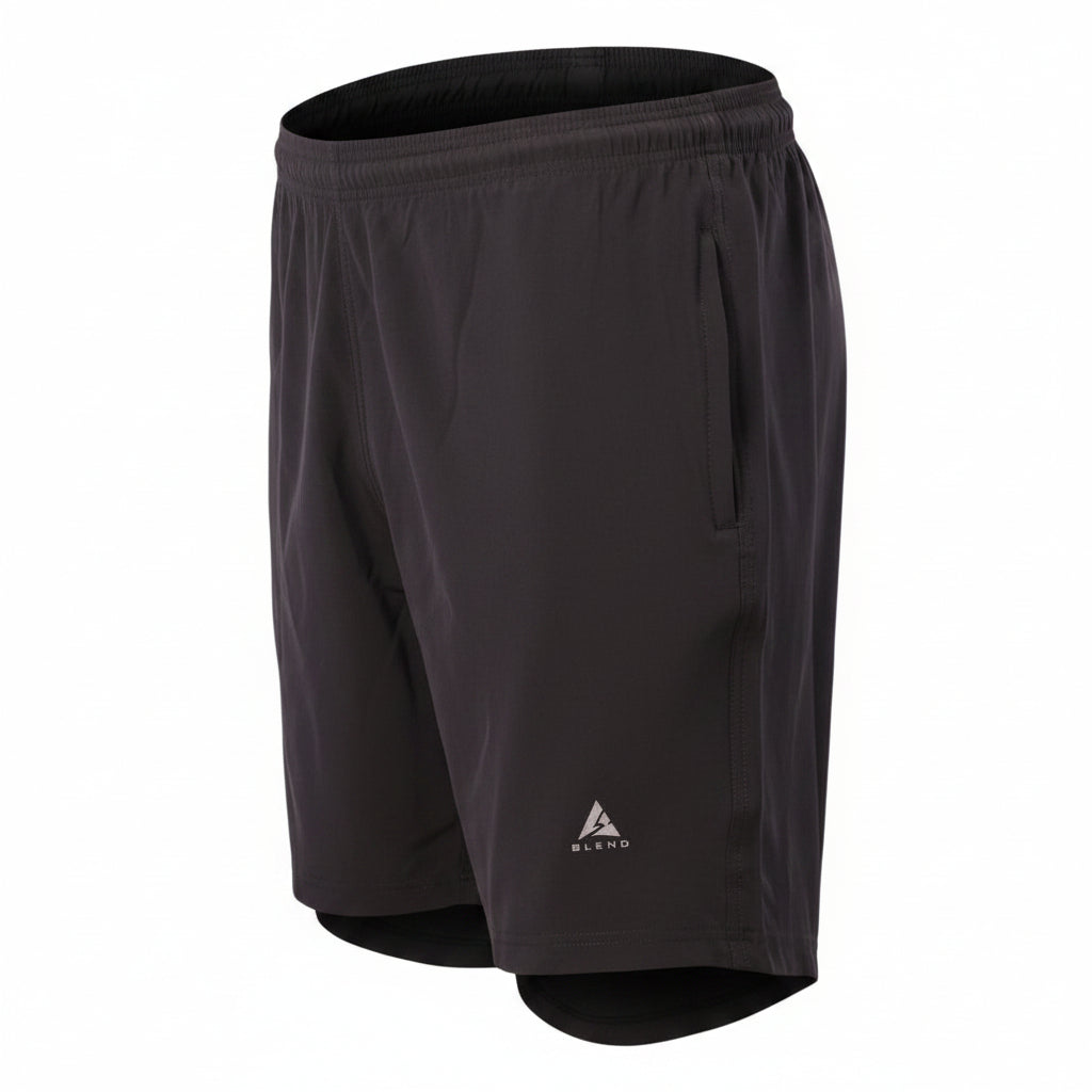 Product view of men's Blend active shorts featuring an elastic waistband and a silver triangular 'A BLEND' logo on the thigh. Displayed as a hollow ghost mannequin floating against a seamless white studio background.