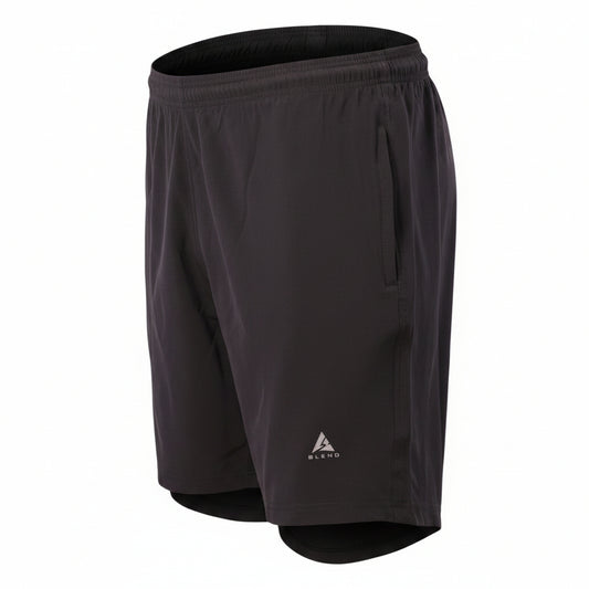 Product view of men's Blend active shorts featuring an elastic waistband and a silver triangular 'A BLEND' logo on the thigh. Displayed as a hollow ghost mannequin floating against a seamless white studio background.