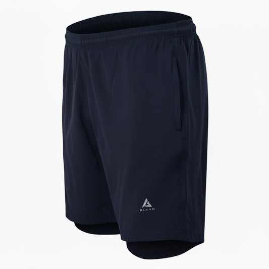 A high-end, professional ghost mannequin product photograph of the specific dark navy blue athletic pants shown in image_22.png, presented in a clean, detailed side profile view. All visible mannequin elements, specifically the light-skinned arm and hand resting on the waistband and the small patch of abdomen, are entirely removed, making the pants appear seamlessly filled by an invisible person. The area where the arm used to be shows the undisturbed side of the pants and the reconstructed waistband with t