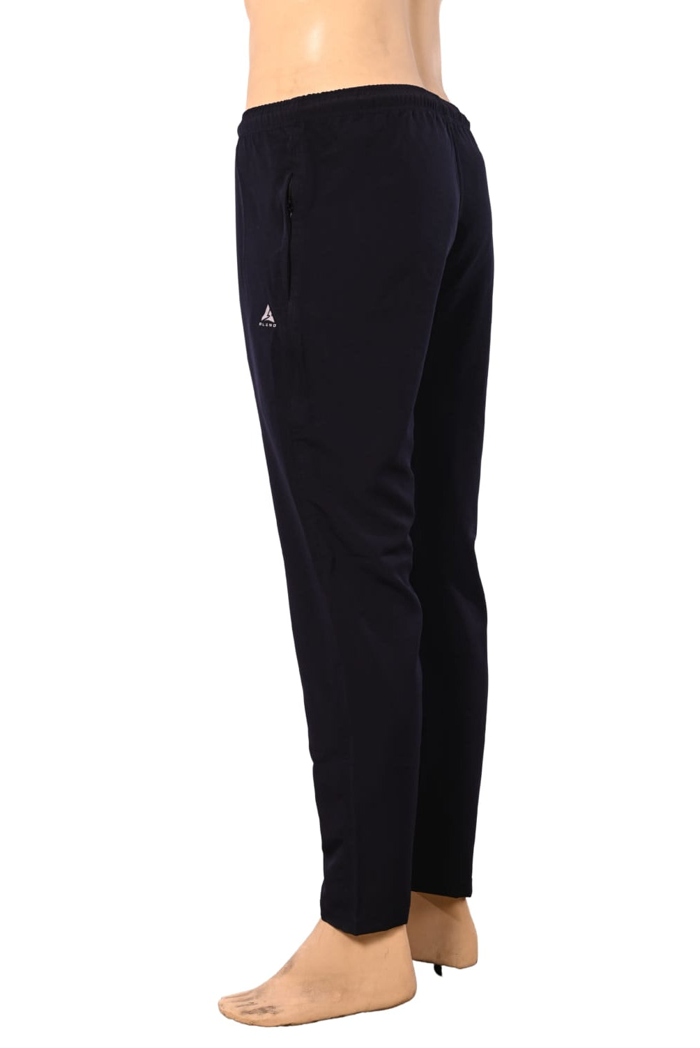 Front three-quarter ghost mannequin product shot of men's solid black track pants. The pants feature an elastic waistband and a silver 'A BLEND' logo on the left thigh, displayed as a hollow garment against a pure white studio background.